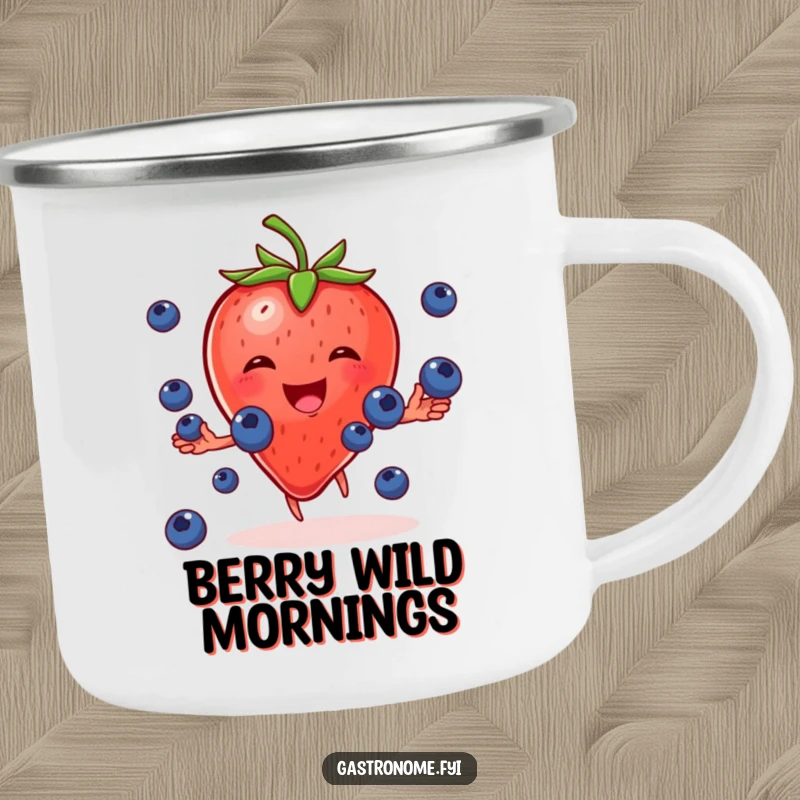 Funny camping mug featuring a cheerful strawberry character gleefully juggling small blueberries, perfect for outdoor enjoyment.