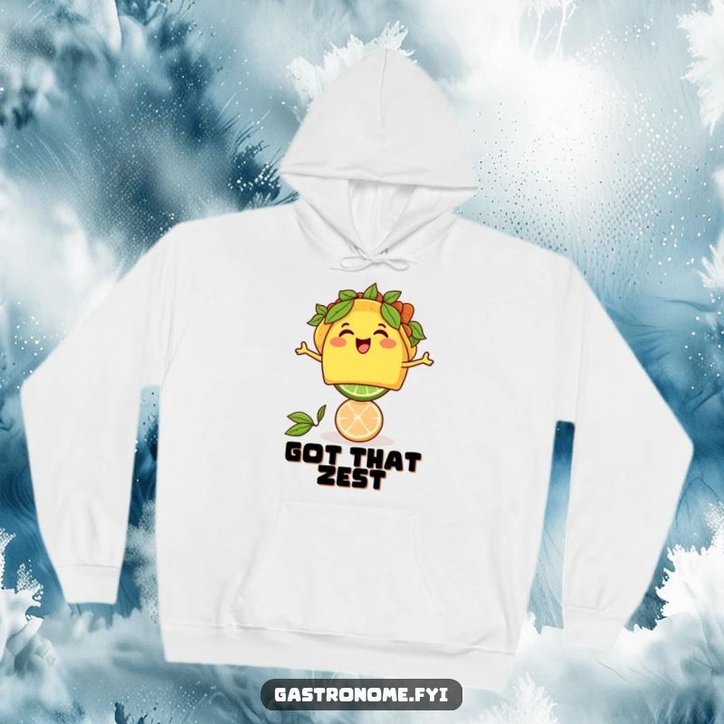 Funny thrilled taco character balancing a lime, depicted on a comfortable and humorous hoodie for food lovers.