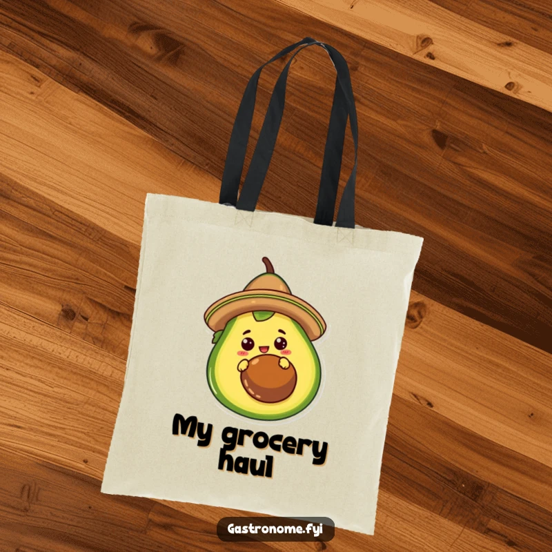 Funny Tote Bag showcasing a curious taco character in a sombrero, peeking from behind a giant avocado. Practical and humorous.