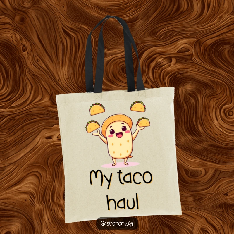 Funny tote bag with a cheerful taco character juggling mini tacos, perfect for carrying groceries and fiesta vibes.
